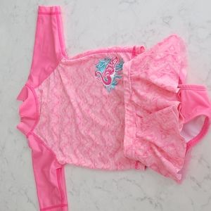 UV SKINZ SWIM SUIT SIZE 12-18M. PINKS AND TEAL. SPF 50